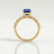 Allure round blue sapphire and diamond scatter engagement ring in yellow gold – view 2