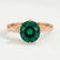 Annora twist solitaire engagement ring in 18k rose gold with a round lab-grown emerald centre stone, front view.