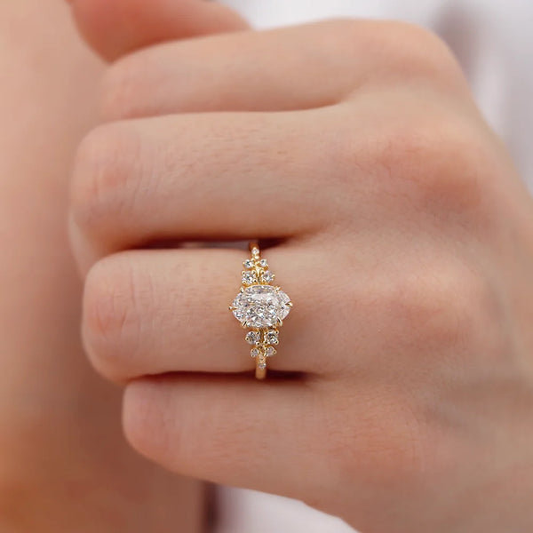 Alya Oval cut lab dimaond D colour 1.00ct cluster shoulder set engagement ring 18k yellow gold Lily Arkwright