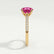 Catalina solitaire engagement ring in 18k yellow gold with a round pink lab-grown sapphire centre stone, end-on view showing the setting and band.