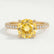 Catalina solitaire engagement ring in 18k yellow gold with a round yellow lab-grown sapphire centre stone, front view.