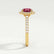 Cecily halo engagement ring in 18k yellow gold with a round lab-grown ruby centre stone and diamond accents, end-on view showing the setting and band.
