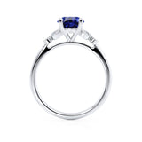 DELILAH - Round Blue Sapphire 18k White Gold Shoulder Set Ring Engagement Ring Lily Arkwright
