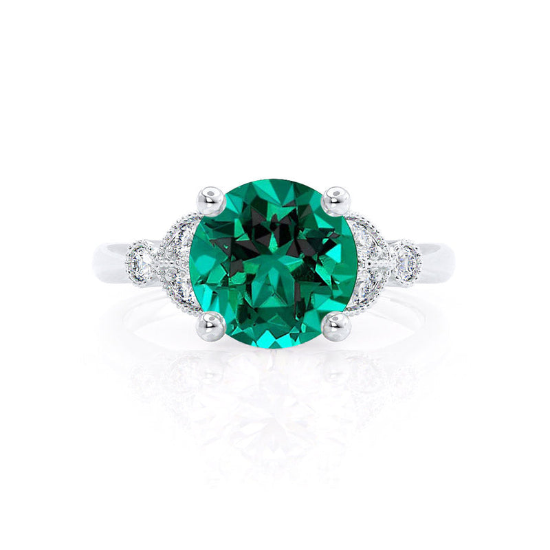 DELILAH - Round Emerald 18k White Gold Shoulder Set Ring Engagement Ring Lily Arkwright