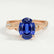 Eden vine solitaire engagement ring in 18k rose gold with an oval blue lab-grown sapphire centre stone and diamond accents, front view.