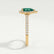 Harlow halo engagement ring in 18k yellow gold with a pear-shaped lab-grown emerald centre stone and diamond accents, end-on view showing the setting and band.