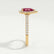 Harlow halo engagement ring in 18k yellow gold with a pear-shaped lab-grown ruby centre stone and diamond accents, end-on view showing the setting and band.
