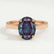 Isabella solitaire engagement ring in 18k rose gold with an oval lab-grown alexandrite centre stone, front view.