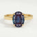 Isabella solitaire engagement ring in 18k yellow gold with an oval lab-grown alexandrite centre stone, front view.
