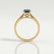 Isabella solitaire engagement ring in 18k yellow gold with an oval lab-grown alexandrite centre stone, end-on view showing the setting and band.