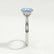 Isabella solitaire engagement ring in platinum with an oval aquamarine-blue lab-grown sapphire centre stone, side profile showing the setting and band.