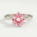 Juliet solitaire engagement ring with a round morganite-pink lab-grown sapphire centre stone, front view.