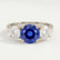 LEANORA - Round Blue Sapphire 18k White Gold Trilogy