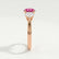 Leanora trilogy engagement ring in 18k rose gold with a round pink lab-grown sapphire centre stone, end-on view showing the setting and band.