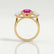 LEANORA - Round Pink Sapphire 18k Yellow Gold Trilogy