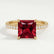 Lively princess ruby and diamond hidden halo ring in yellow gold – view 1