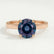 Lottie solitaire engagement ring in 18k rose gold with a round lab-grown alexandrite centre stone, front view.