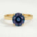 Lottie solitaire engagement ring in 18k yellow gold with a round lab-grown alexandrite centre stone, front view.