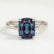 Lulu solitaire engagement ring in platinum with an elongated cushion lab-grown alexandrite centre stone, front view.