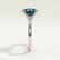 Lulu solitaire engagement ring in 18k white gold with an elongated cushion lab-grown alexandrite centre stone, end-on view showing the setting and band.