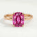 Lulu solitaire engagement ring in 18k rose gold with an elongated cushion pink lab-grown sapphire centre stone, front view.