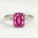 Lulu solitaire engagement ring in platinum with an elongated cushion pink lab-grown sapphire centre stone, front view.