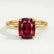 Lulu solitaire engagement ring in 18k yellow gold with an elongated cushion lab-grown ruby centre stone, front view.
