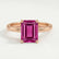 Lulu solitaire engagement ring in 18k rose gold with an emerald-cut pink lab-grown sapphire centre stone, front view.