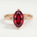 Lulu solitaire engagement ring in 18k rose gold with a marquise lab-grown ruby centre stone, front view.