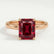 Lulu solitaire engagement ring in 18k rose gold with a radiant lab-grown ruby centre stone, front view.