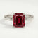 Lulu solitaire engagement ring with a radiant lab-grown ruby centre stone, front view.