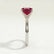 Lulu solitaire engagement ring with a radiant lab-grown ruby centre stone, end-on view showing the setting and band.