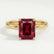 Lulu solitaire engagement ring in 18k yellow gold with a radiant lab-grown ruby centre stone, front view.