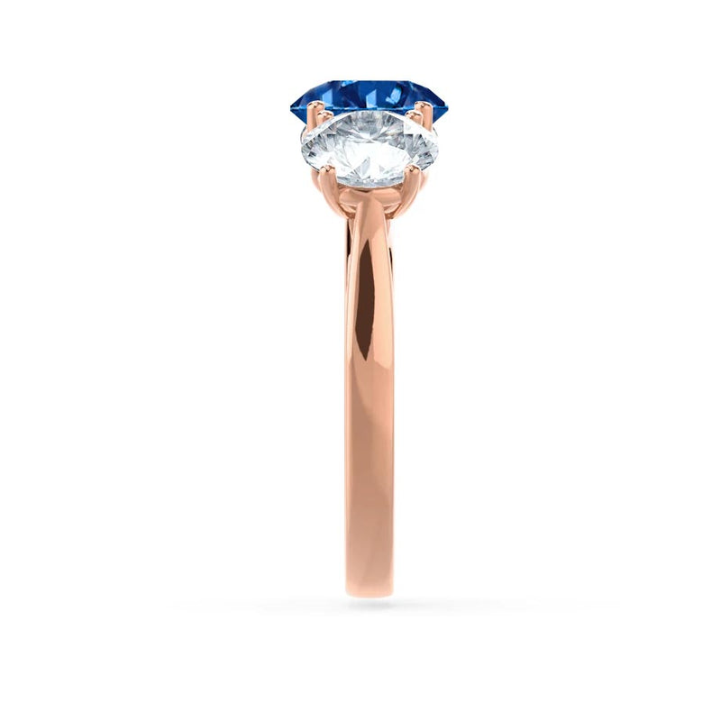 LEANORA - Round Blue Sapphire 18k Rose Gold Trilogy Engagement Ring Lily Arkwright