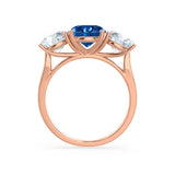 LEANORA - Round Blue Sapphire 18k Rose Gold Trilogy Engagement Ring Lily Arkwright