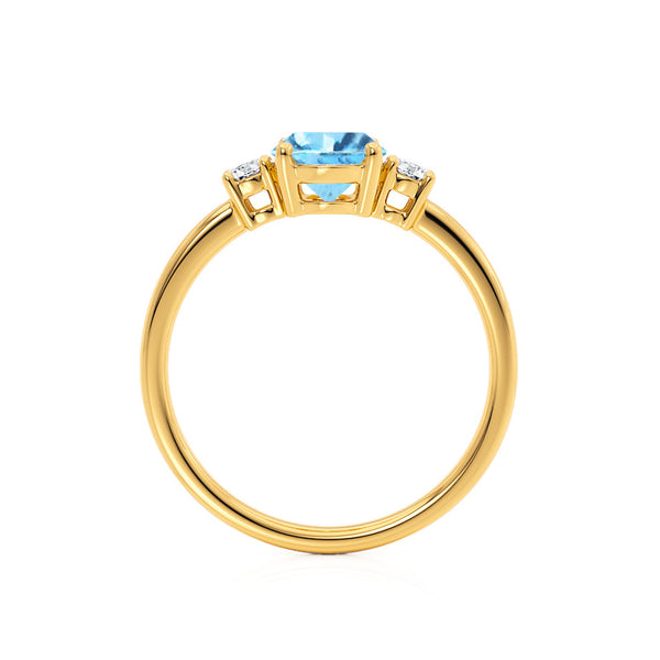 LOUELLA - Chatham® Oval Aqua Spinel Oval Petite Trilogy Engagement Ring 18k Yellow Gold