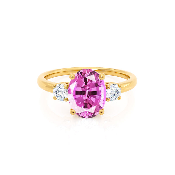 LOUELLA - Chatham® Oval Pink Sapphire Oval Petite Trilogy Engagement Ring 18k Yellow Gold