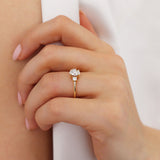 Louella 1.08tcw Oval Cut D-F Moisasanite 18k Yellow Gold Petite Trilogy Ring Lily Arkwright
