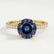 Macy shoulder-set engagement ring in 18k yellow gold with a round lab-grown alexandrite centre stone, front view.