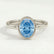 MARGOT - Oval Blue Lab Diamond 18k White Gold Bezel Solitaire