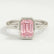 Front view of a pink emerald-cut lab-grown diamond engagement ring in a platinum bezel setting