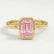 Front view of a pink emerald-cut lab-grown diamond engagement ring in a 18k yellow gold bezel setting
