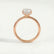 Paris emerald lab diamond hidden halo 18k rose gold engagement ring