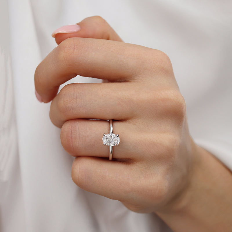 Paris Oval Moissanite 18k White Gold Petite Hidden Halo Solitaire