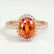 Rosa oval padparadscha and diamond halo ring in rose gold – view 1