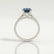 Viola shoulder-set engagement ring in platinum with an oval lab-grown alexandrite centre stone and diamond accents, side profile showing the setting and band.