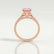 Viola solitaire engagement ring in 18k rose gold with a round morganite-pink lab-grown sapphire centre stone, side profile showing the setting and band.