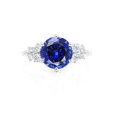 ALYA - Chatham® Round Blue Sapphire Starburst Cluster Shoulder Set Engagement Ring 18k White Gold