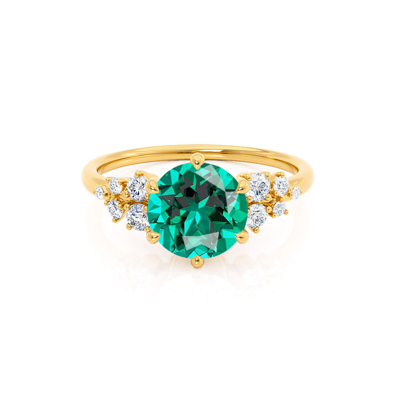 ALYA - Chatham® Round Emerald Starburst Cluster Shoulder Set Engagement Ring 18k Yellow Gold