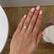 Iris 1.00ct D-F Colour Charles & Colvard Forever One Moissanite 6.5mm 18k White Gold Solitaire Channel Set Ring Lily Arkwright 